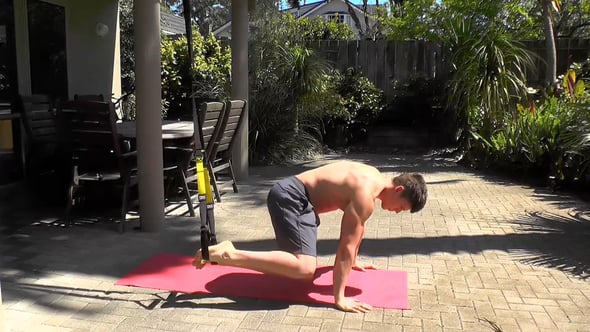 TRX-Suspended Knee Tucks To The Elbow