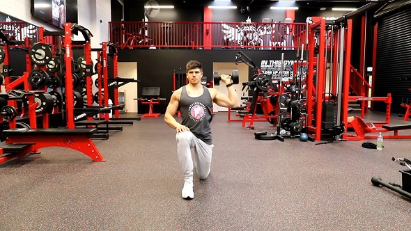 Single Arm Dumbbell Shoulder Press In Lunge Position